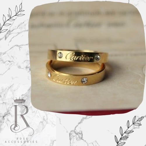 خاتم كارتيه مطلي وعليه ختم البراند ضمان سنه عاللون