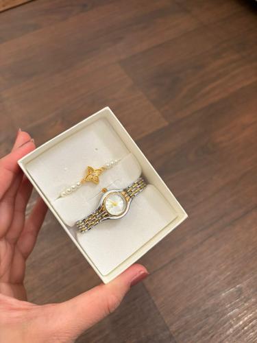 A metal watch with the bracelet suitable from mont...