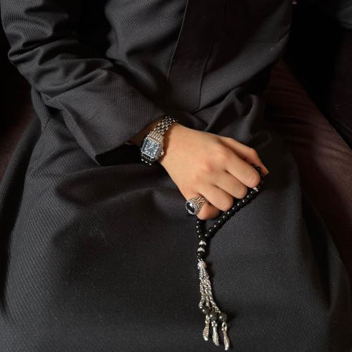 A watch with a prayer bead and a ring suitable for ages 4 to 12 years