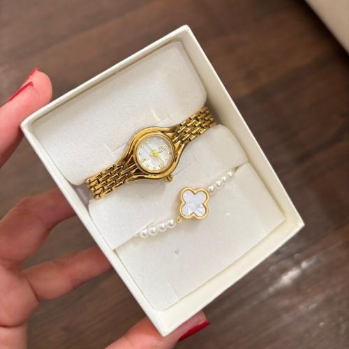 A watch made of metal with a bracelet