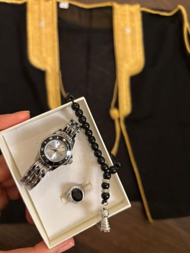 A suitable watch, prayer bead, and ring from 9 mon...