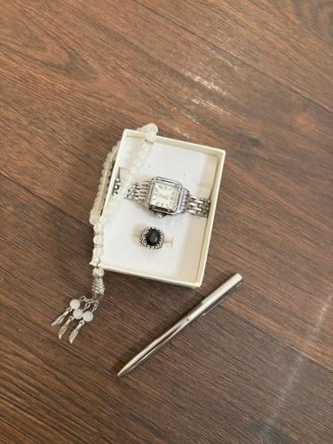 A watch with a prayer bead, ring, and pen (suitable from age 4 to 15 years)