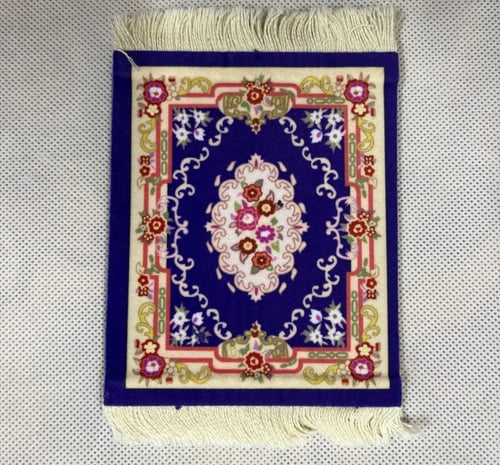 كوستر بشكل سجادة