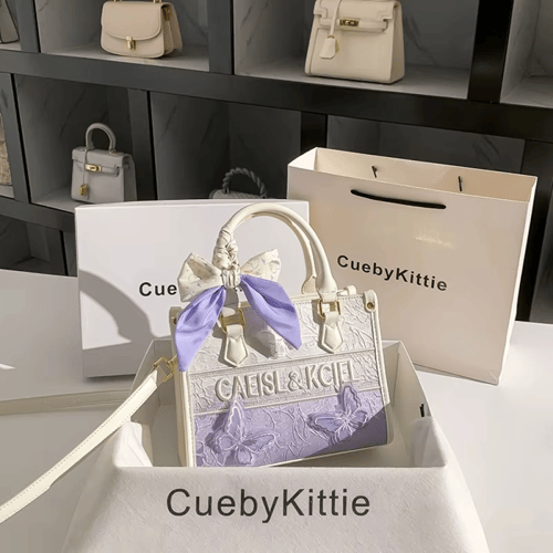 حقيبة يد نسائية بتصميم فراشة