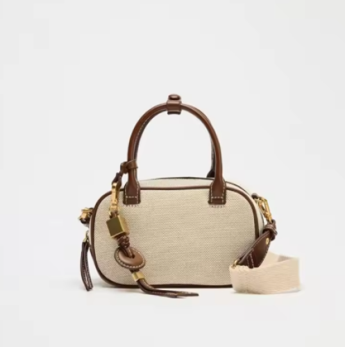 حقيبة صغيرة ذات غرز علوية