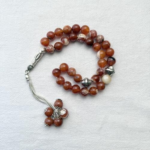 سبحة حجر عقيق عسلي ممزوج بالبني