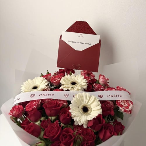 باقة ورد الجربيرا والبيبي روز