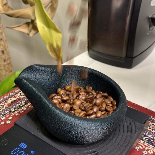 Coffee bean measuring cup