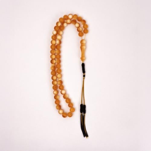 سبحة مستكة برتقالي مرقط أبيض