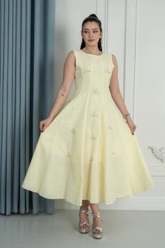 فستان بلون اصفر فاتح ميد فصوص