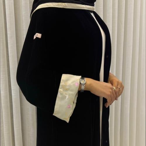 Shawq abaya - black velvet - half calf length - sleeve fabric off-white embroidered with roses