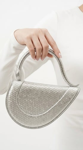 حقيبة "النجمة الذهبية" (The Golden Icon Clutch)