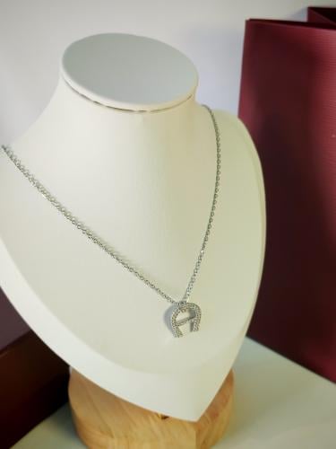 سلسال اغنر لوقو فضي