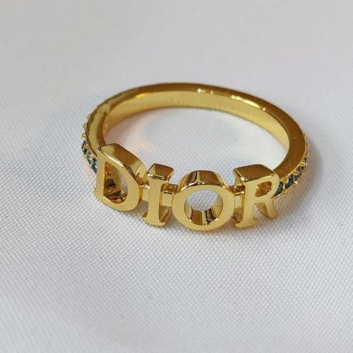 خاتم Dior ذهبي بفصوص زرقاء