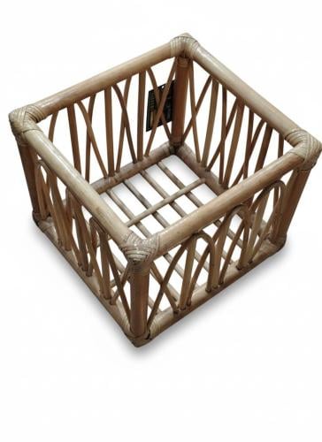A square basket made of natural rattan