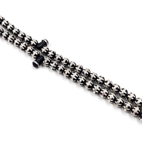 السبحة الفاخرة – سبحة خشب الكوك مطعّمة بعظم الجمل...