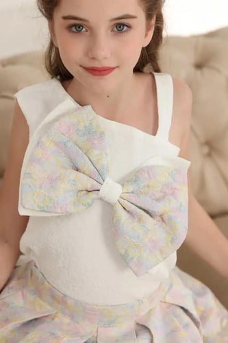 بلوزة بفيونكة في الصدر 7161