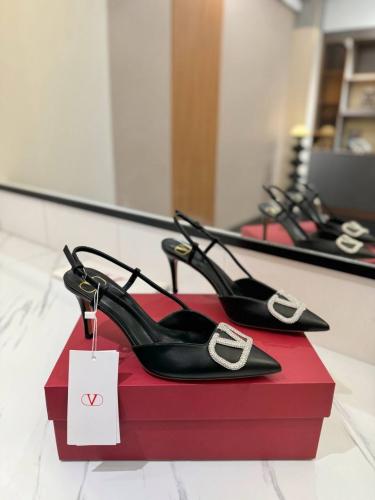 هيلز فالنتينو Valentino pointed-toe V-buckle sandals.