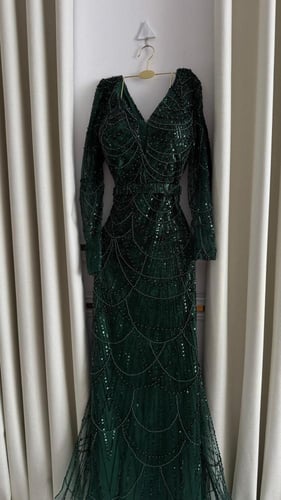 فستان سهرة كلفه لول