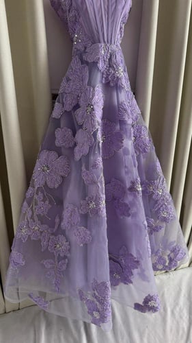 فستان سهرة كلفة ورد