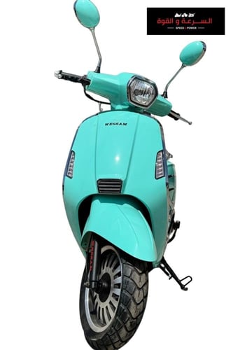 دراجة نارية عجيب وسام ناري موديل 2024 اللون اخضر