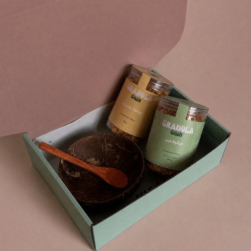 Box 2 containers of granola and a plate of coconut