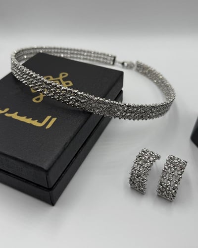 طقم دوريكا أبيض