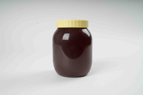 عسل طبيعي بالتوت البري 1 كيلو