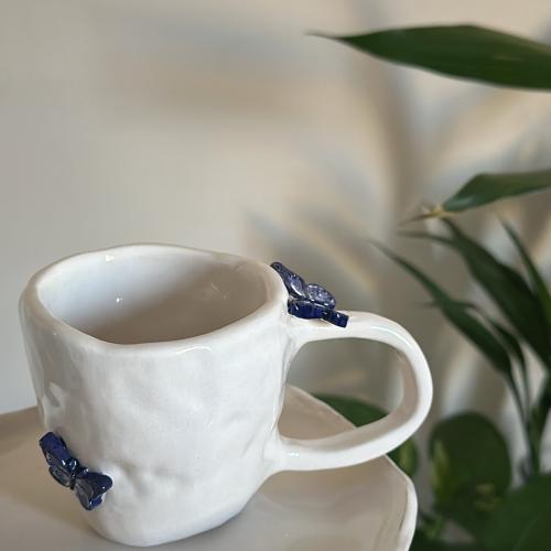 كوب فراشات