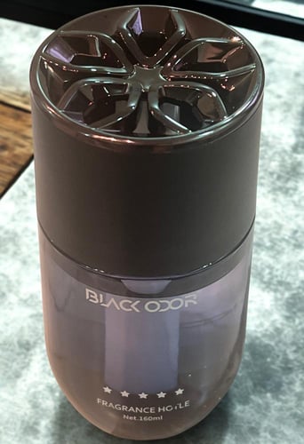 معطر جو يستخدم في السيارة أو الأماكن المغلقة