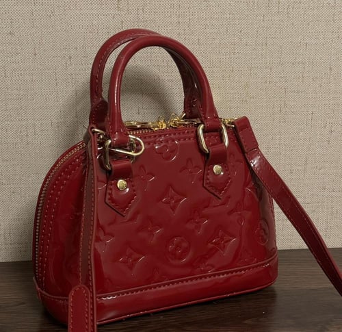 لويس فيتون ميني عنابي