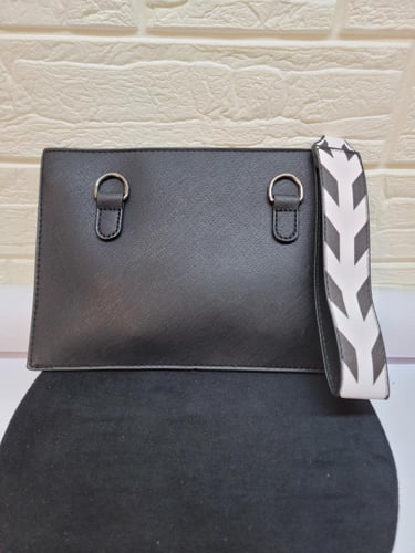 حقيبه كلاتش بتصميم لوحه سينما