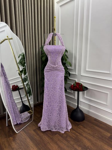 فستان سهره أخضر يخطف الأنظار،