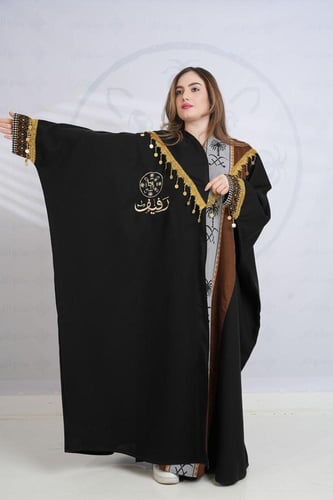 بشت اسود نسائي متزين بقماش السدو البني
