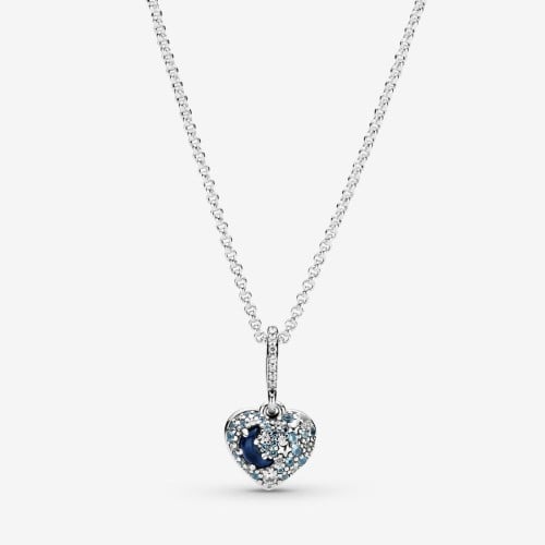A necklace decorated with a slu-gly heart that includes a blue moon and stars
