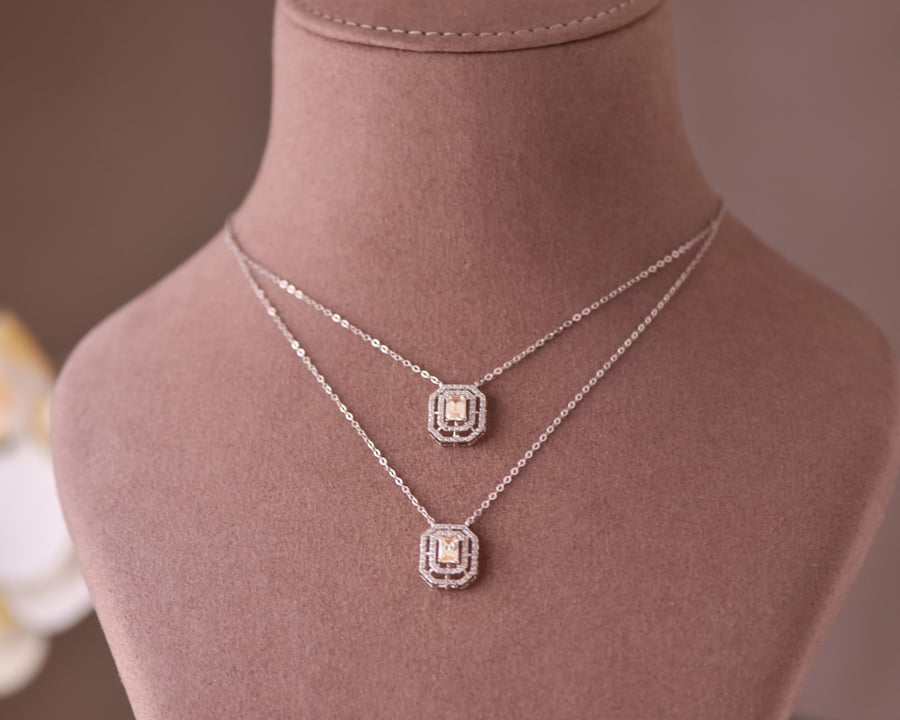 18k white gold necklace set with treated fancy stones