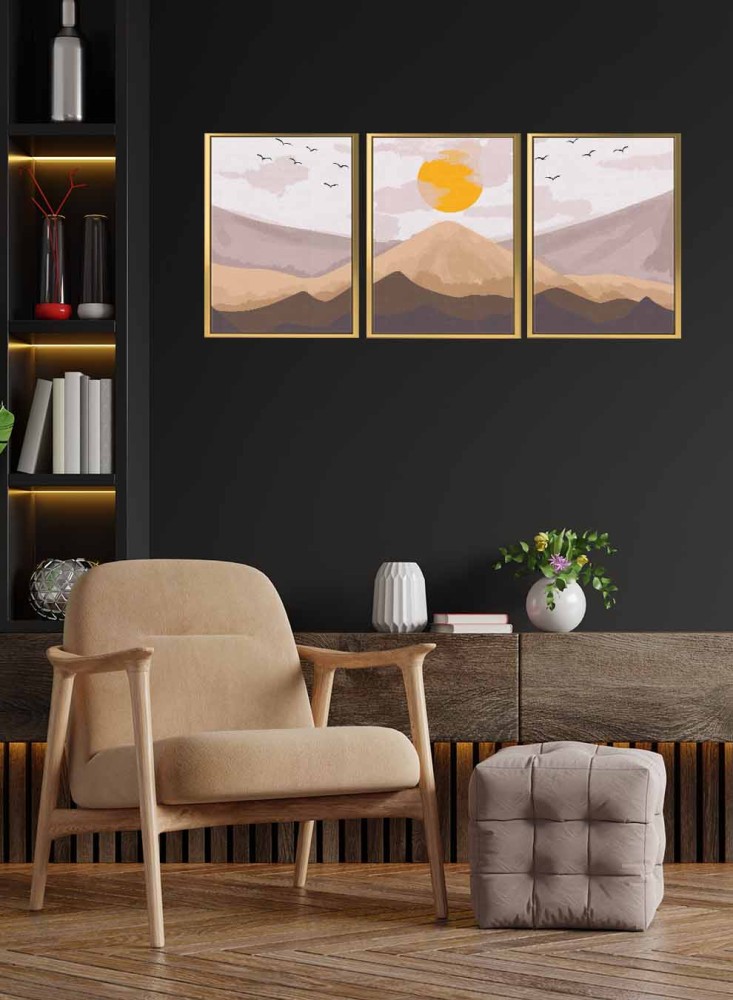 A set of 3 canvas panels on a wooden frame with an abstract art design of sunrise over the mountain