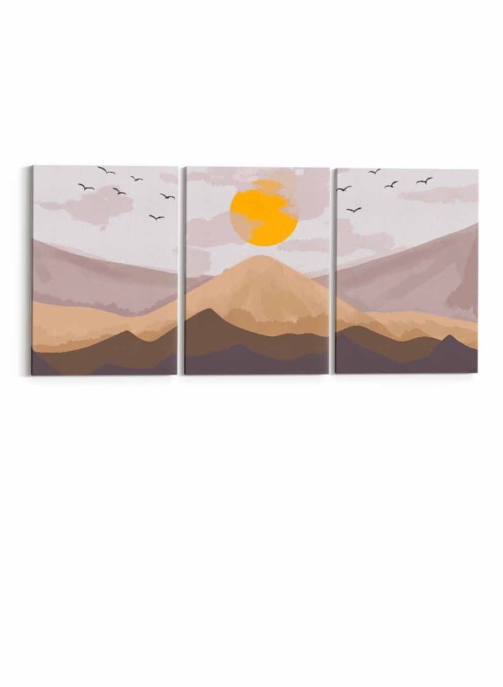 A set of 3 canvas panels on a wooden frame with an abstract art design of sunrise over the mountain