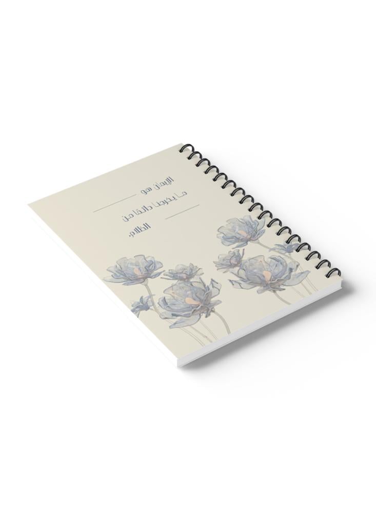 A 60-page wire-bound notebook with a cardboard cover featuring the design of faith is what brings us out of darkness.