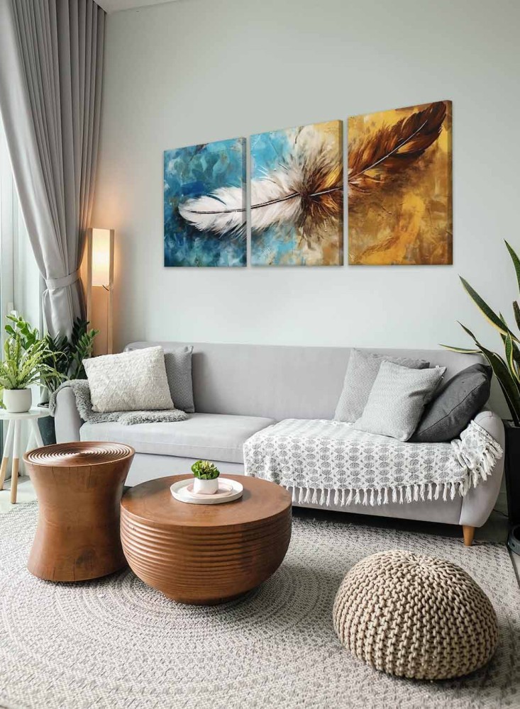 A set of 3 canvas panels on a wooden frame with an abstract art design of a colorful brush.