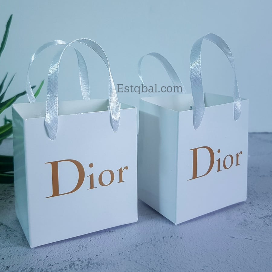 A dozen (12) pieces of Dior bags