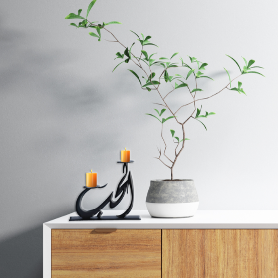 Metal candle holder with the phrase love