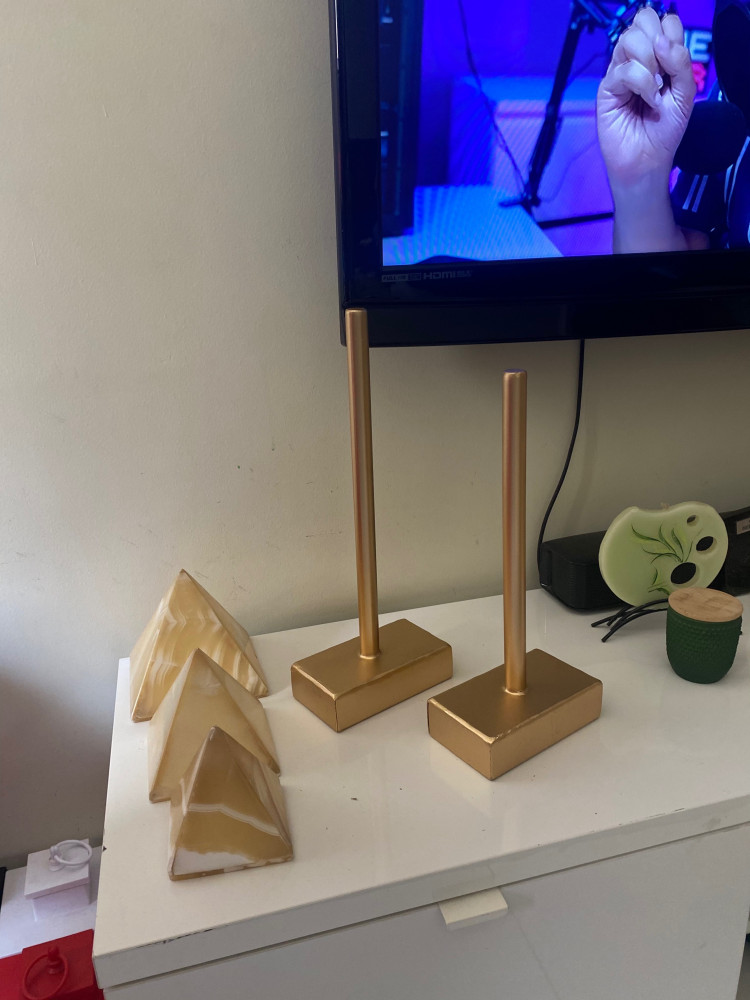 Gold-colored stand