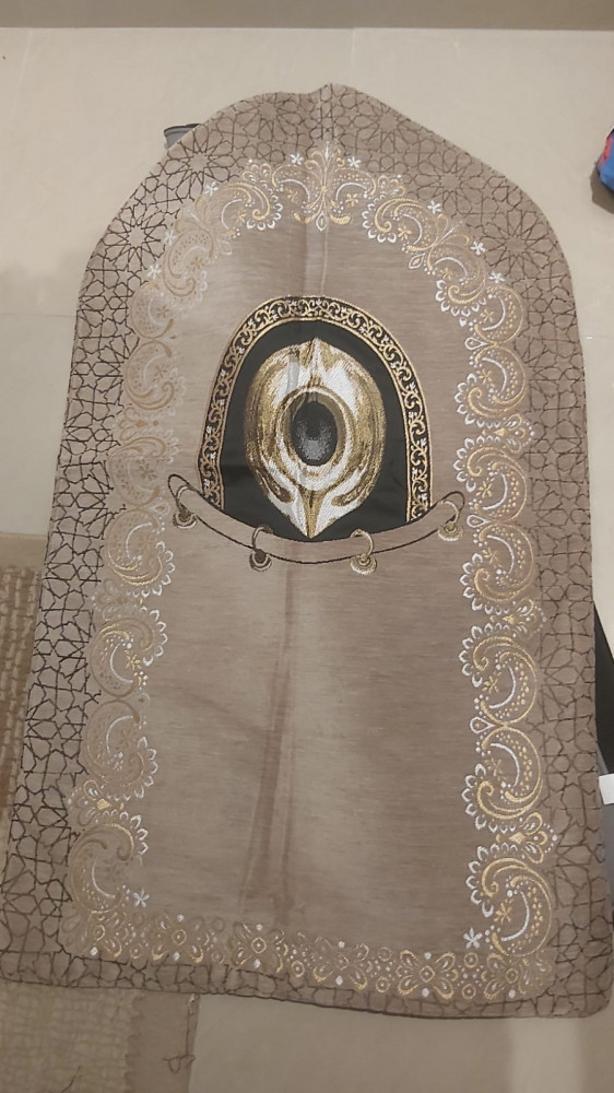 A prayer rug with a Mazrab design in dark beige color and light foam