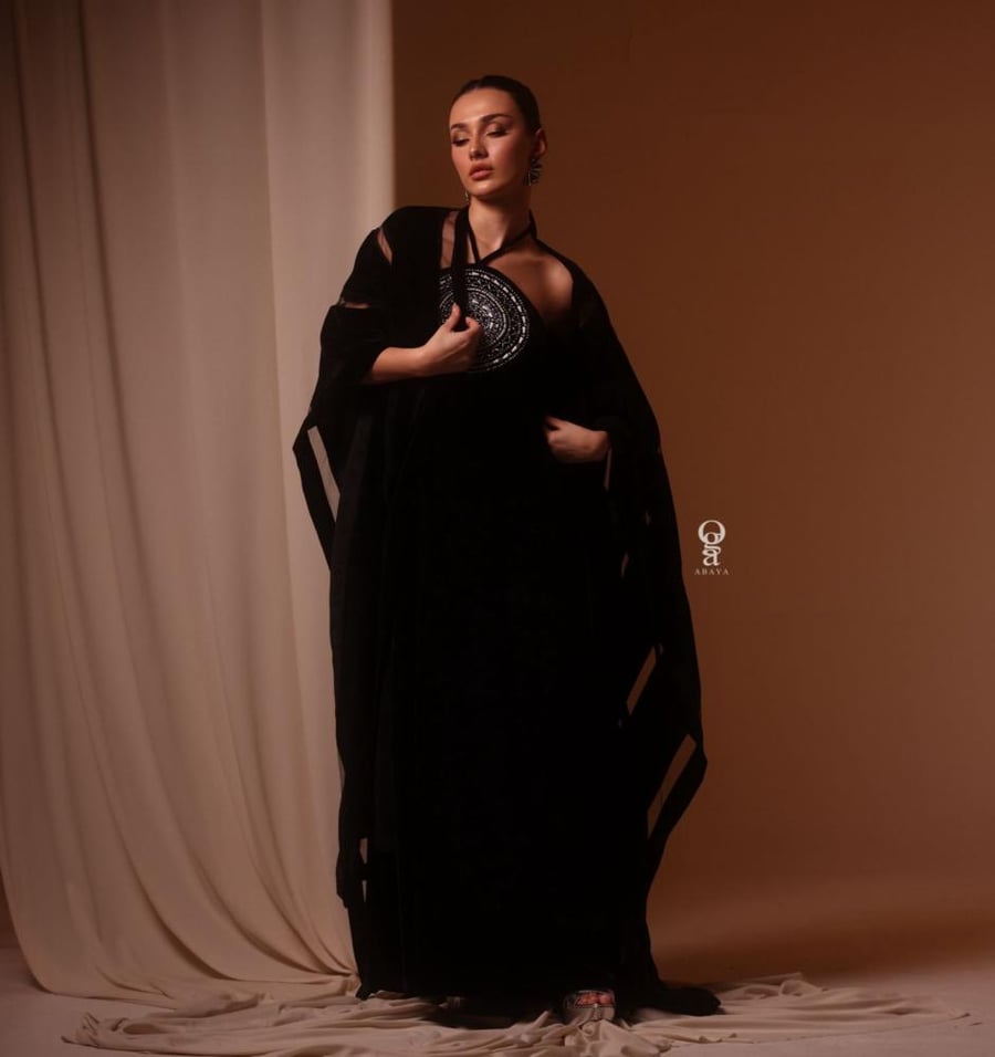 Black thobe with a checkered circle and hand embroidery