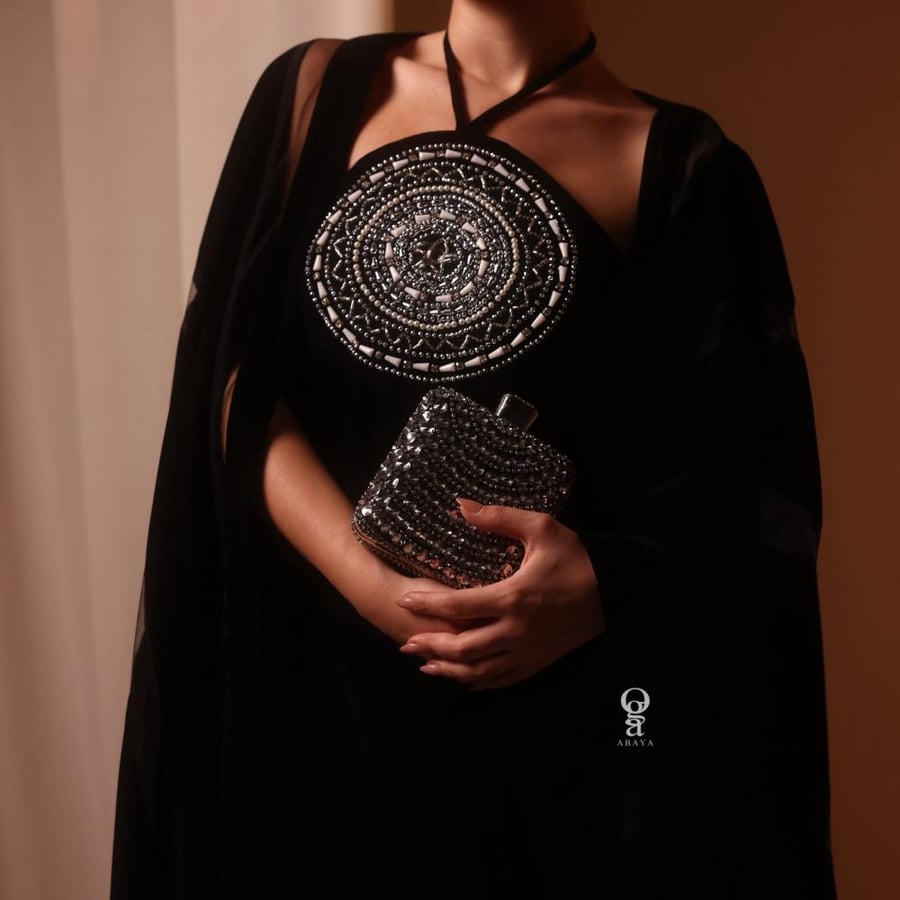 Black thobe with a checkered circle and hand embroidery