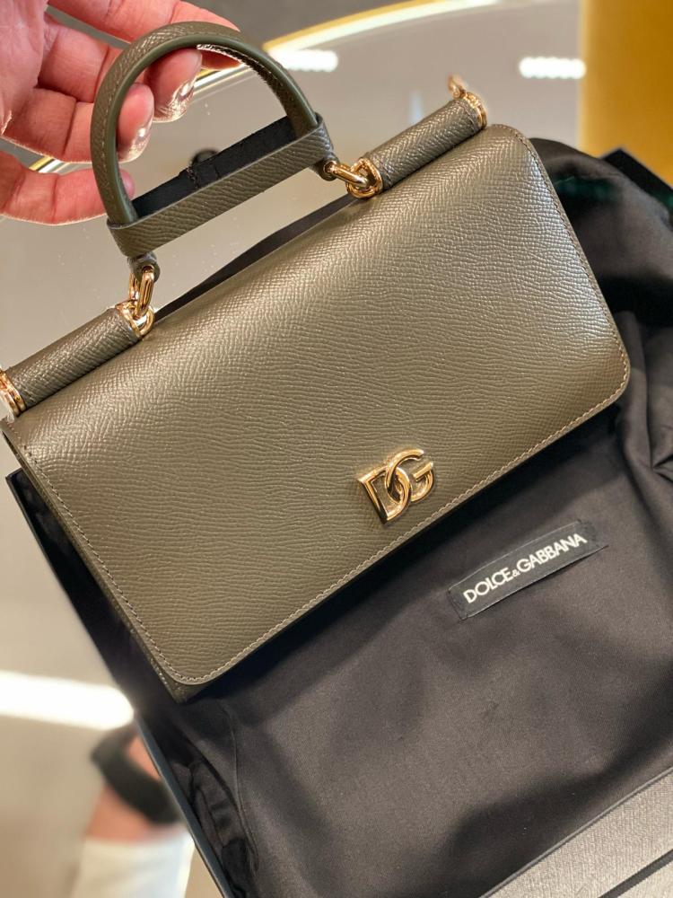 شنطة اي فون زيتي. D&g