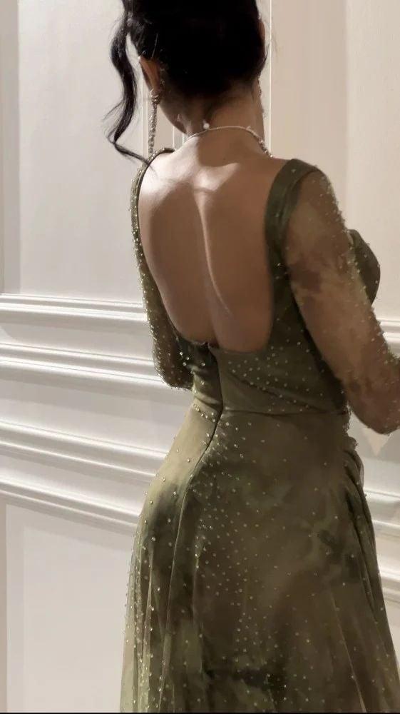 فستان سهرة زيتوني مرصع فصوص فخم
