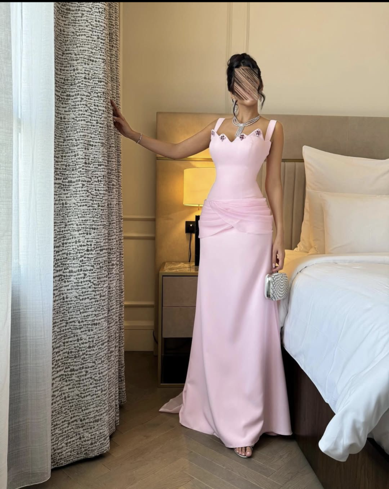 Long pink evening dress decorated with crystal with a back train