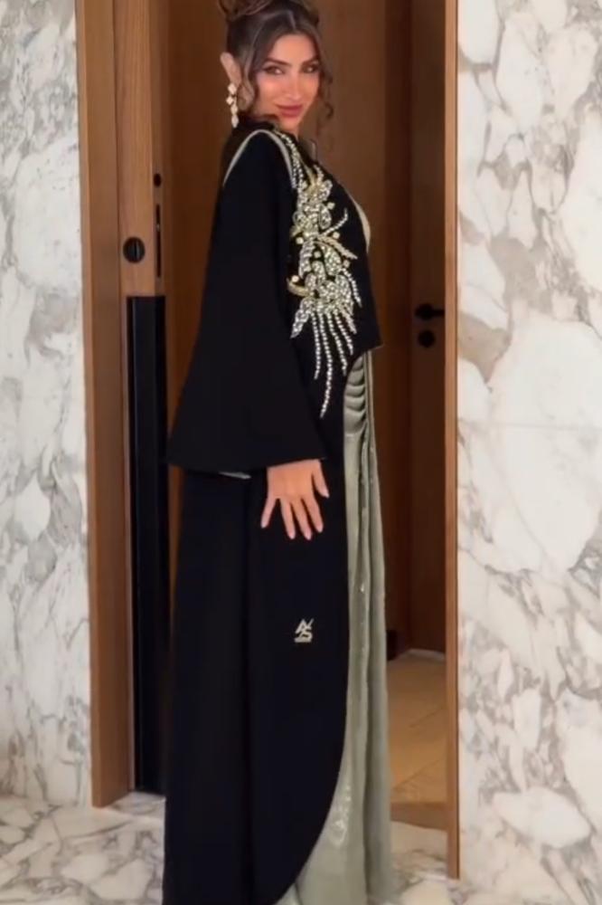 فستان سهرة زيتوني مع جاكيت أسود بتطريز فاخر